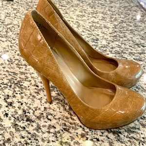 Fun tan heels.Buy one get one 1/2 off